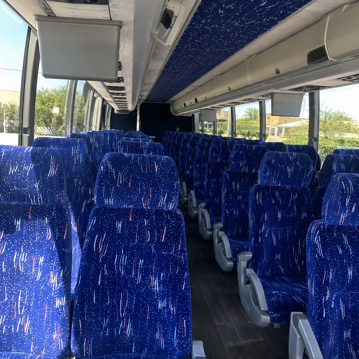 long distance charter buses for dfw sports fans traveling to away games